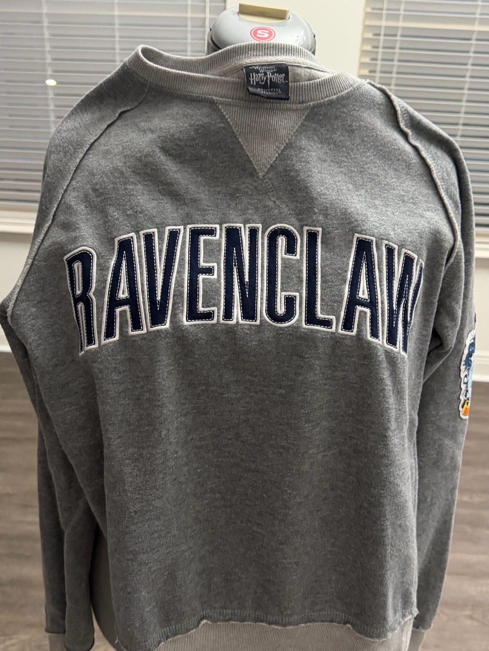 Warner Bros. Black and Gray Apparel Tag Close-Up